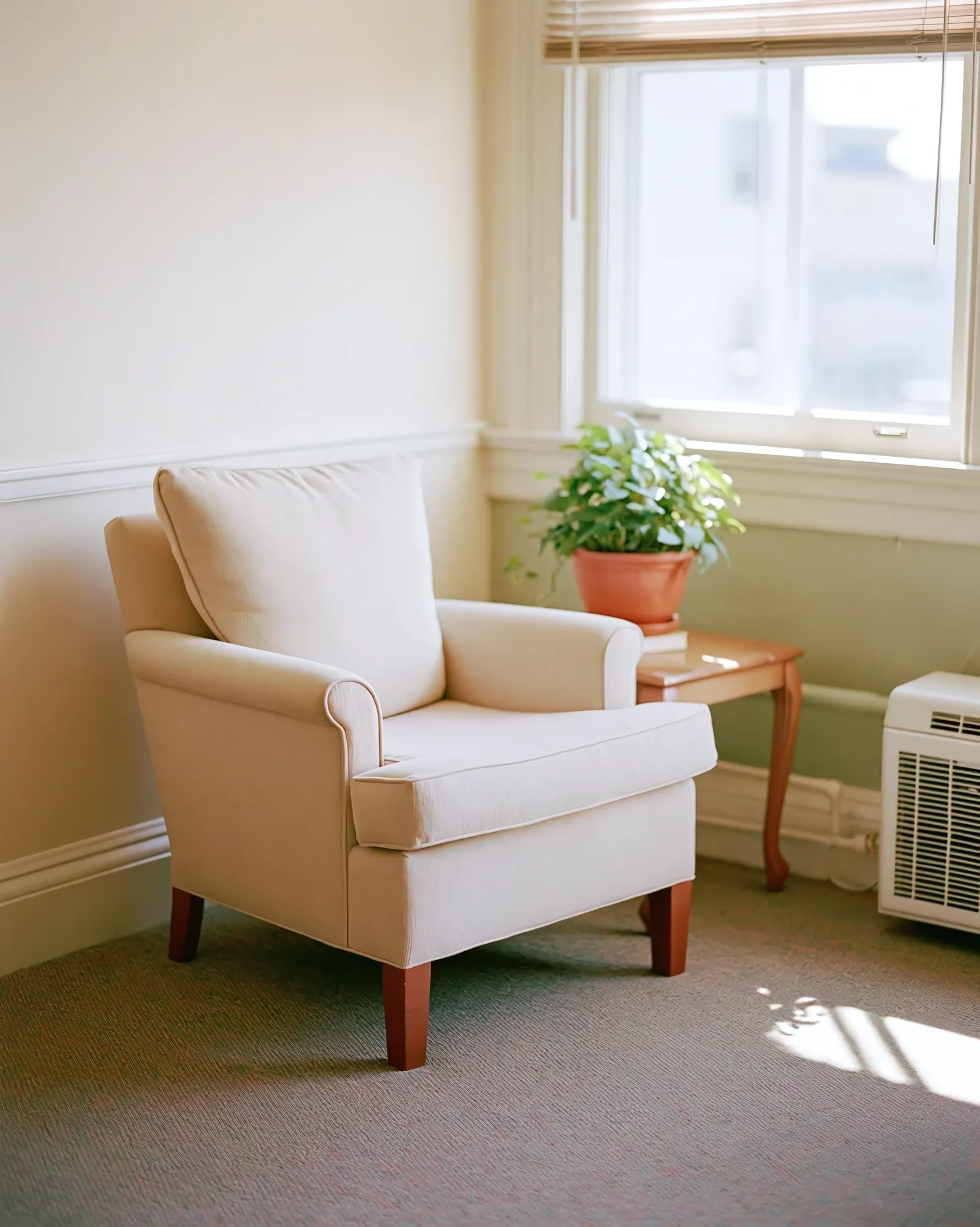 An armchair in warm window light